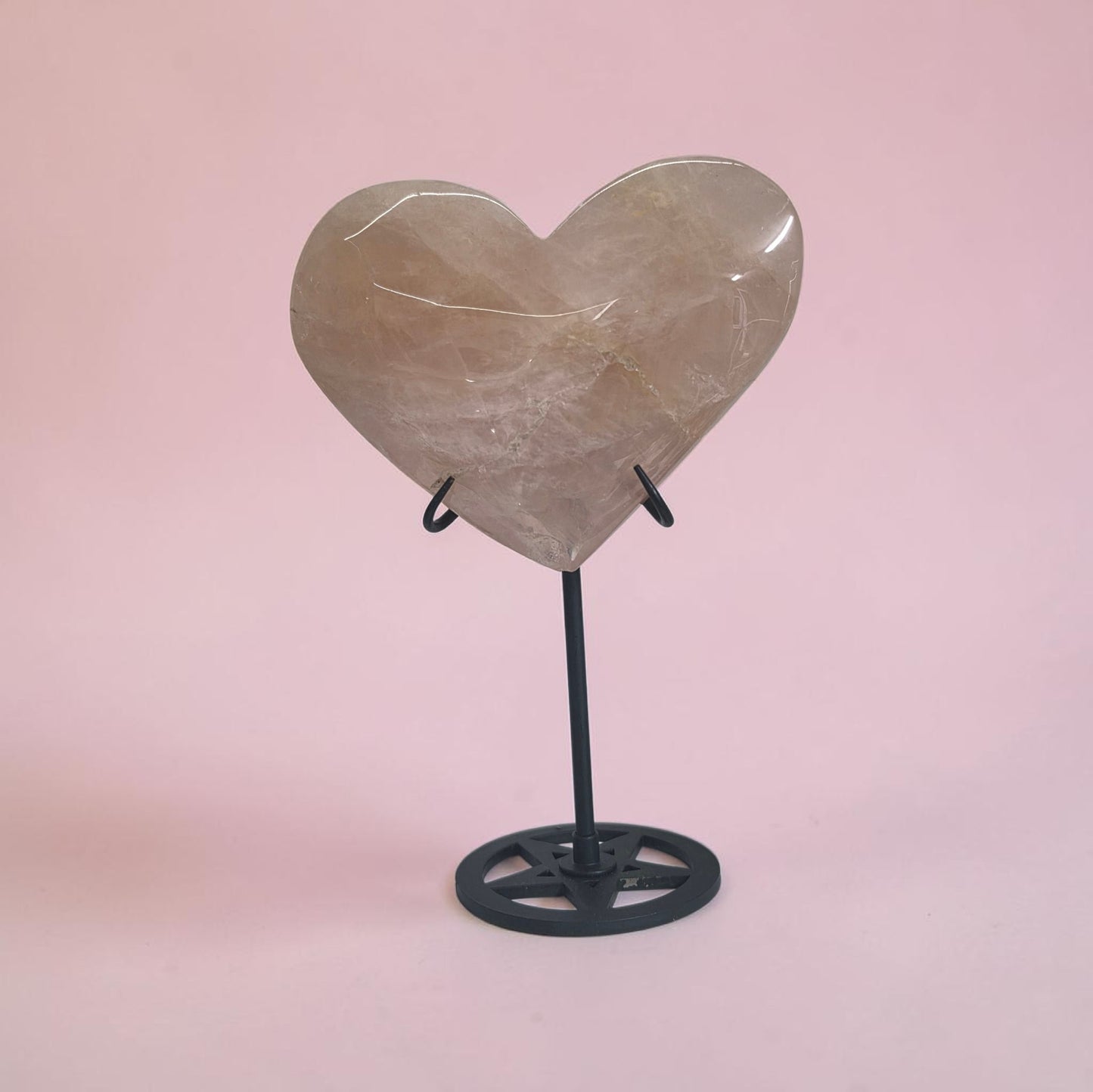 Large rose quartz heart statement piece on stand