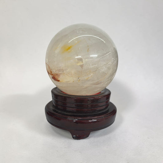 Big clear quartz statement sphere with inclusions